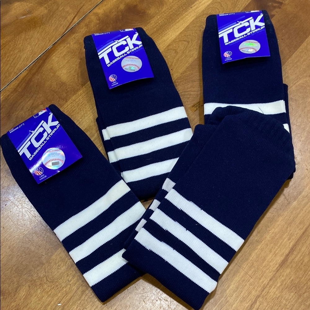 NWT.  4 pair, TCK, size medium, baseball stirrups.